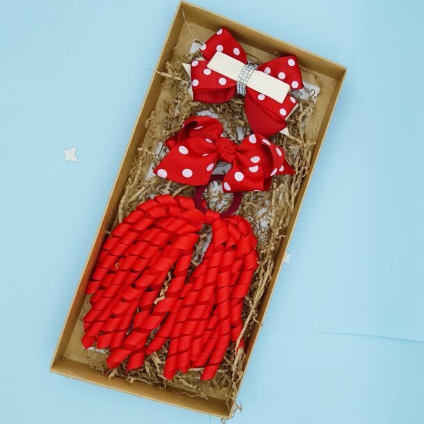 Raudona garbanėlė ir segtukai