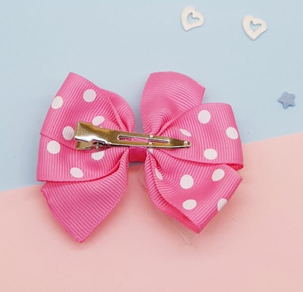 Rožinis bantukas. Užsegimas