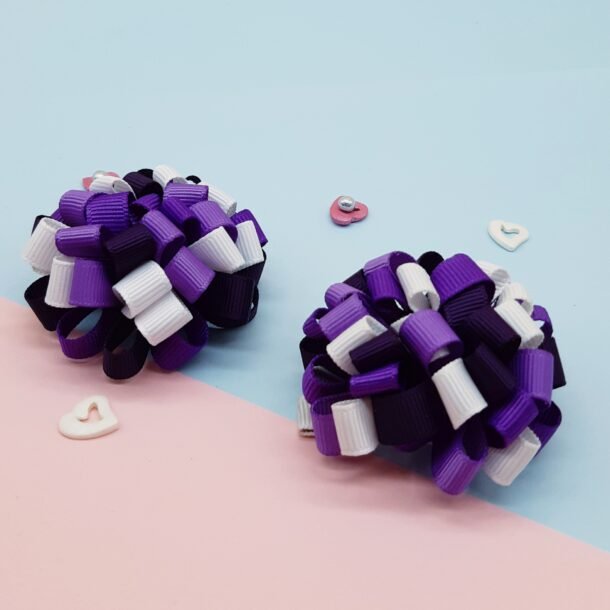 Segtukai violetiniai ir baltos spalvos burbuliukai