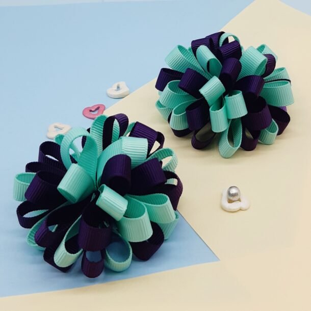 baklazanines ir metines spalvos segtukai burbuliukai